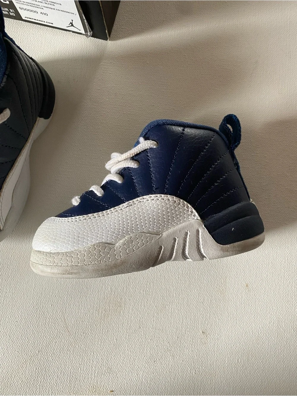 Nike Kids Navy and White Jordan 12’s